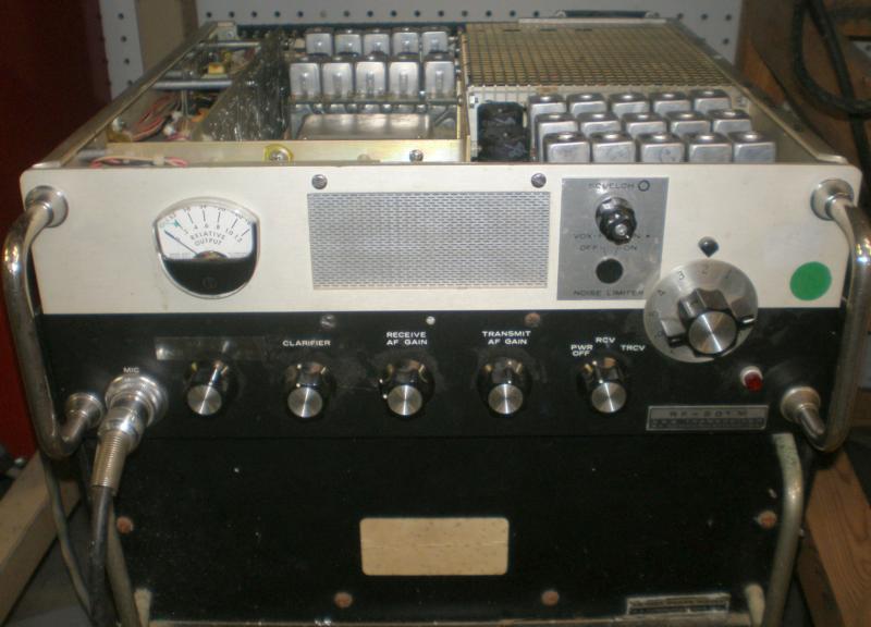 Vintage commercial radios like this Harris RF-201M hybrid SSB/AM transceiver get new life with a four channel board and Epson oscillator with sufficient accuracy for SSB. 
